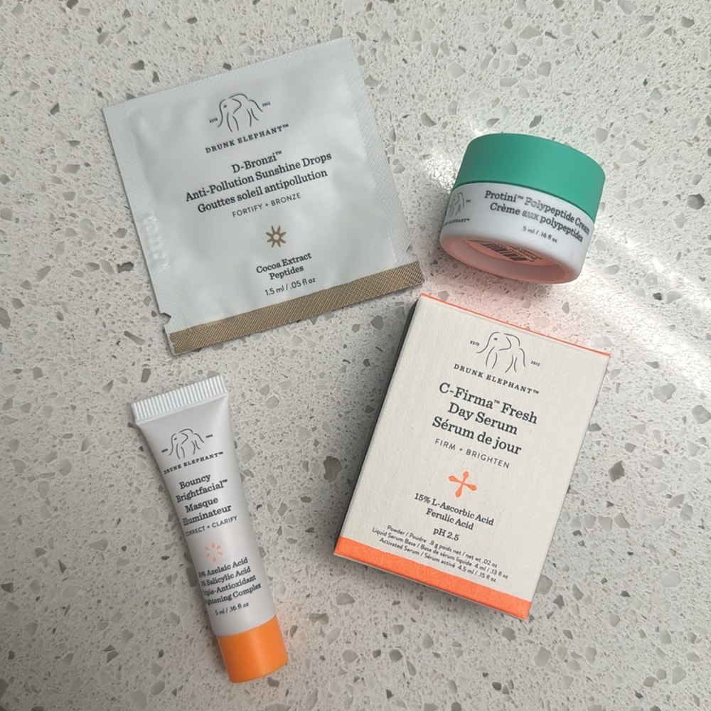 Drunk Elephant deluxe minis/travel with makeup bag